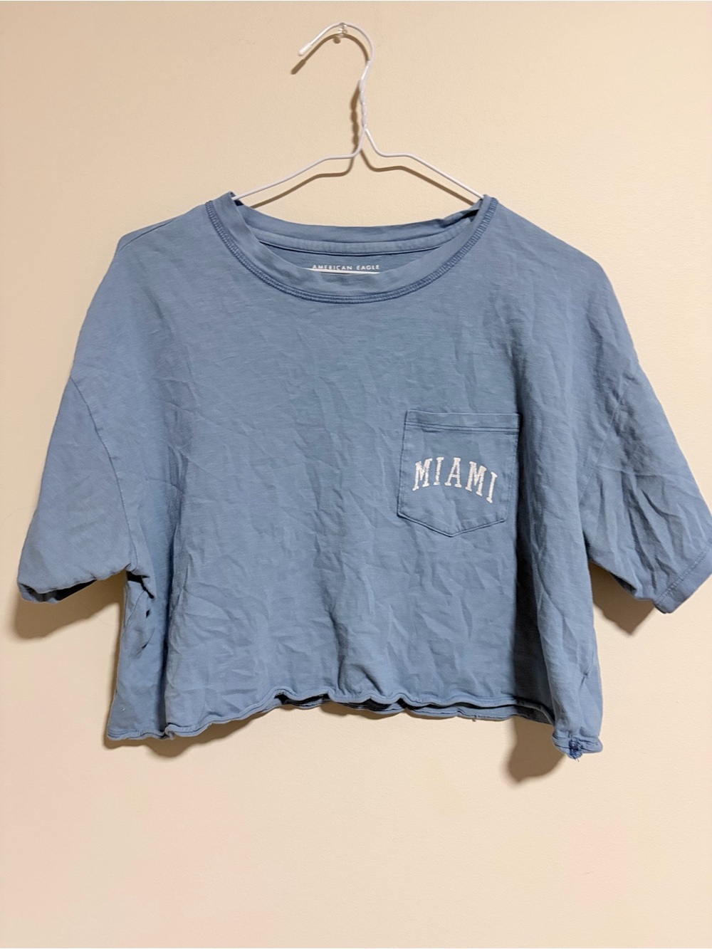 American Eagle Outfitters Light Blue Cropped 'Miami' Pocket Tee